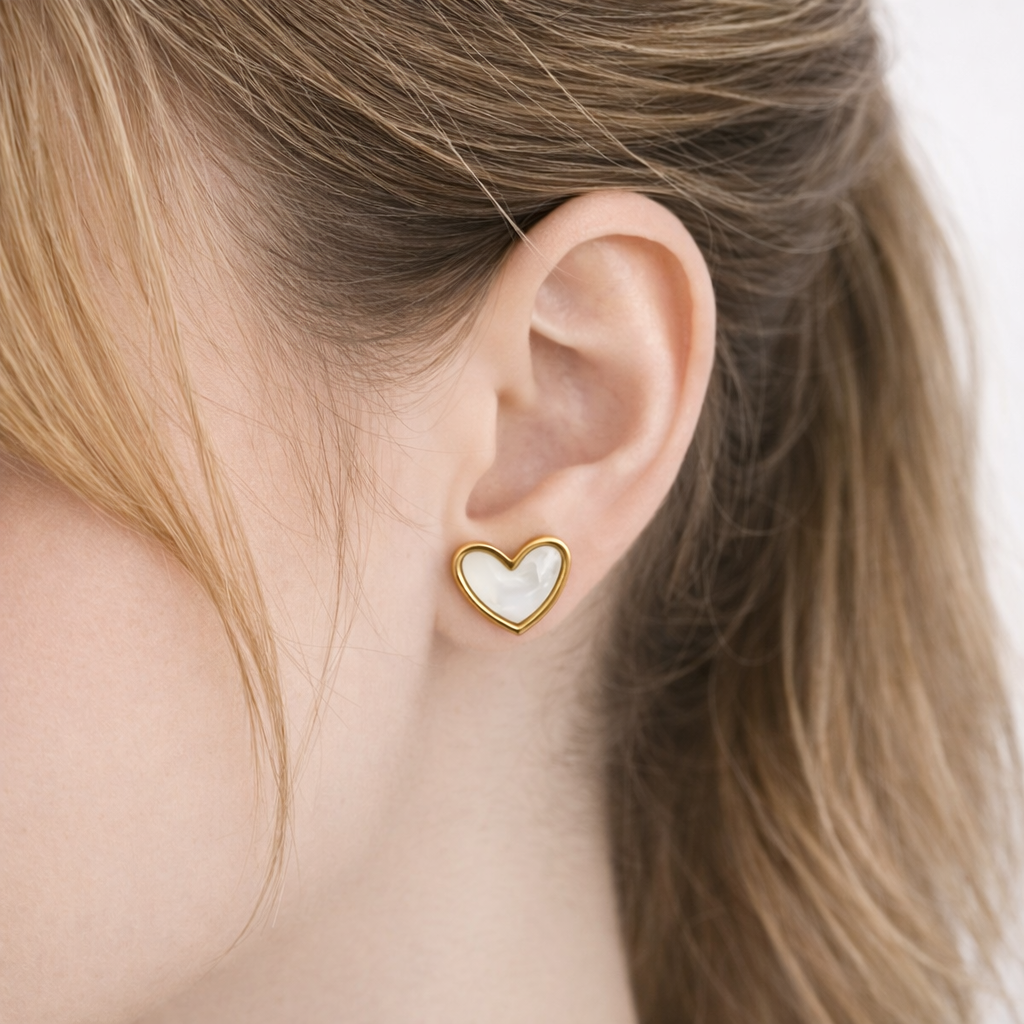 Stainless steel heart-shaped earrings with a gold-tone frame - white
